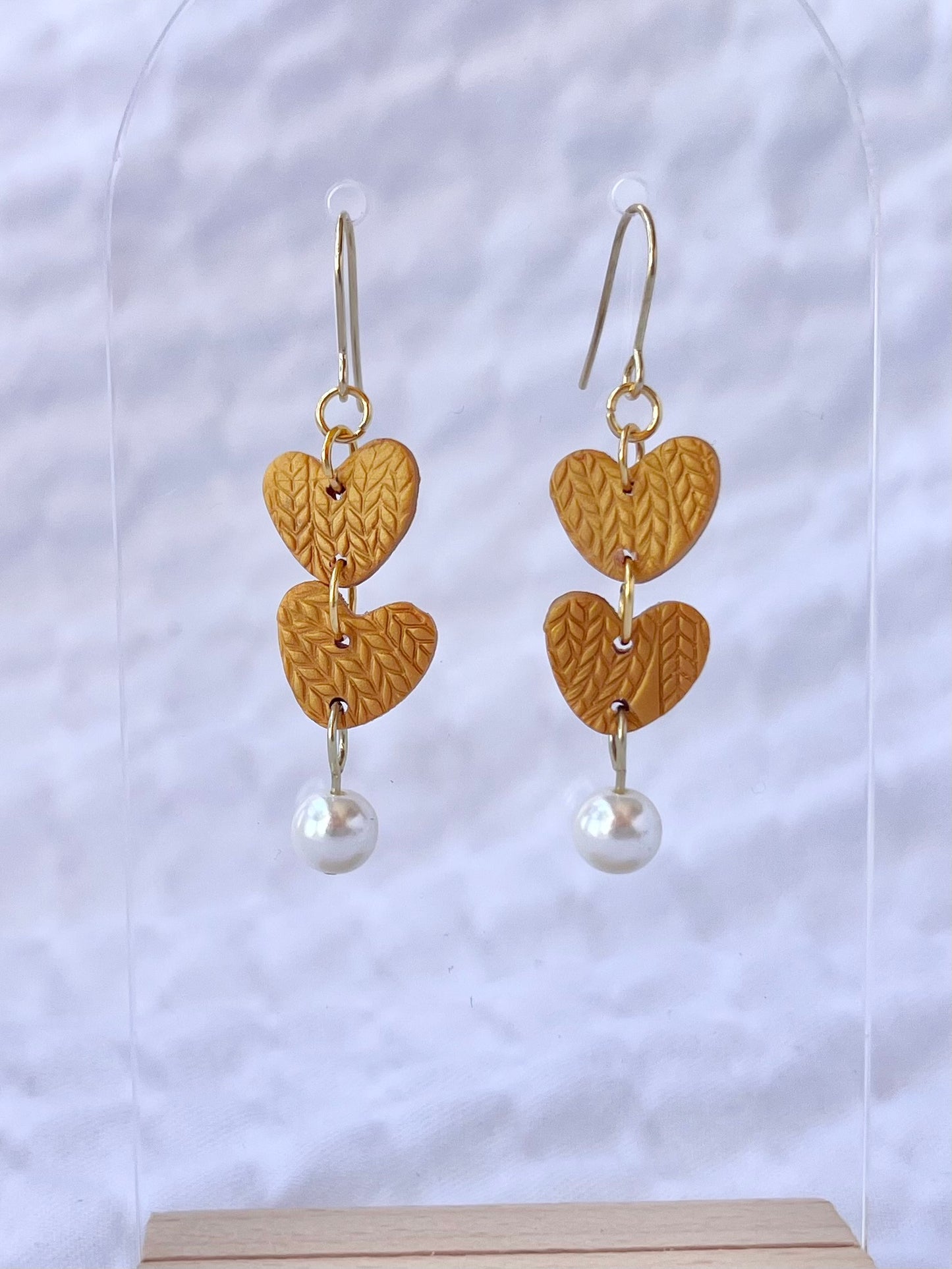 Corazones y perlas acogedores